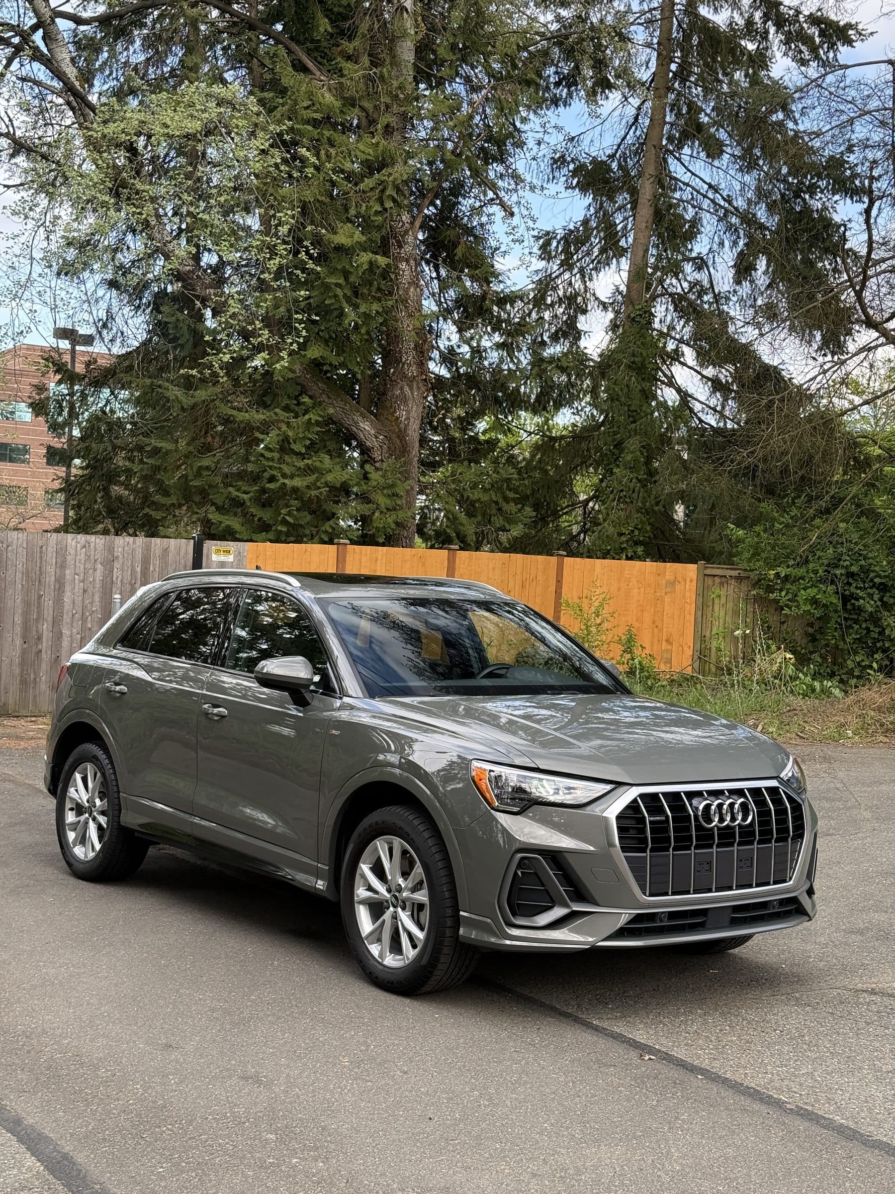 Gray Audi Q3 with glossy paint after a ceramic coating