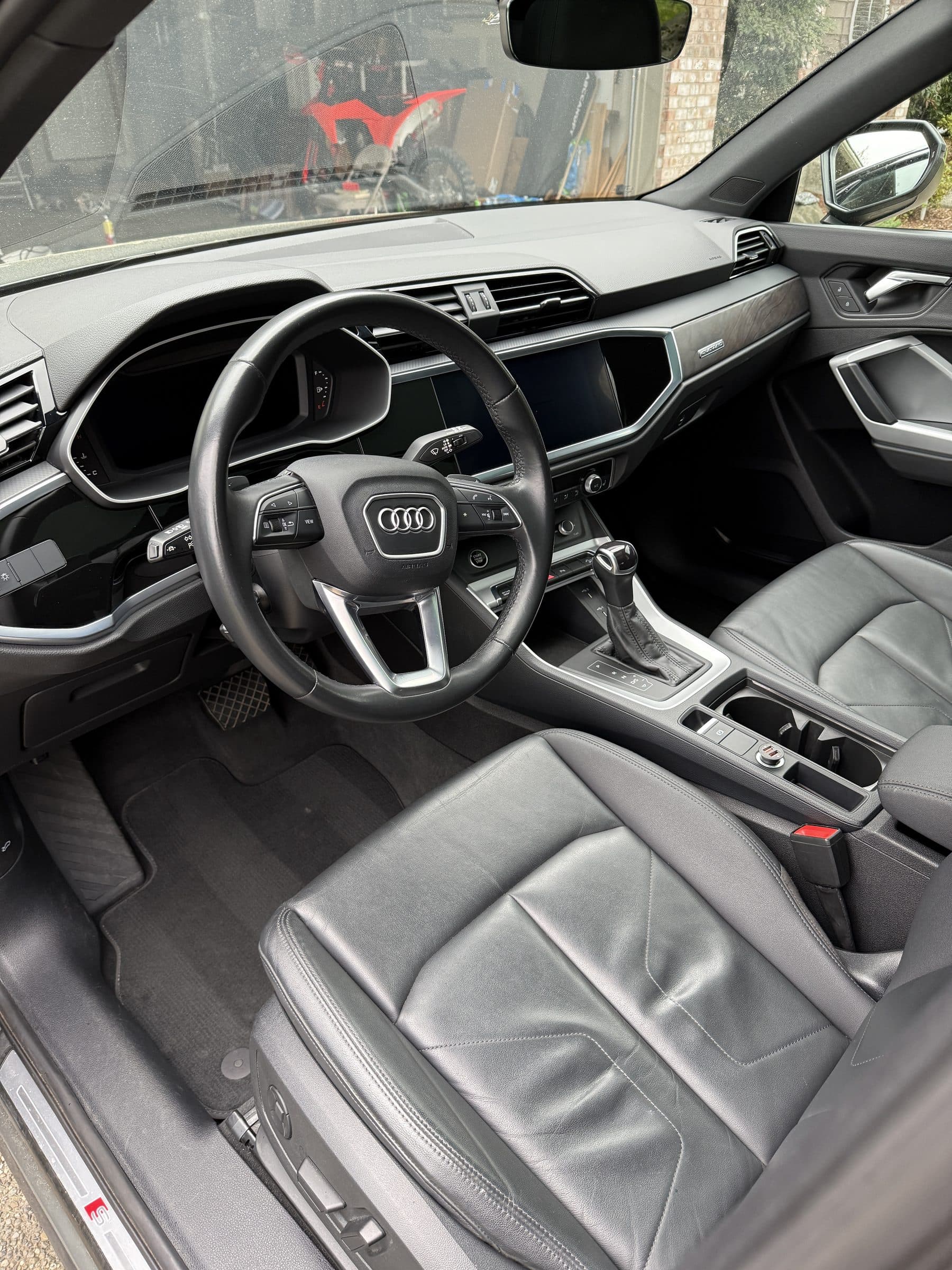 Clean Audi Q3 front interior after a mobile interior detail