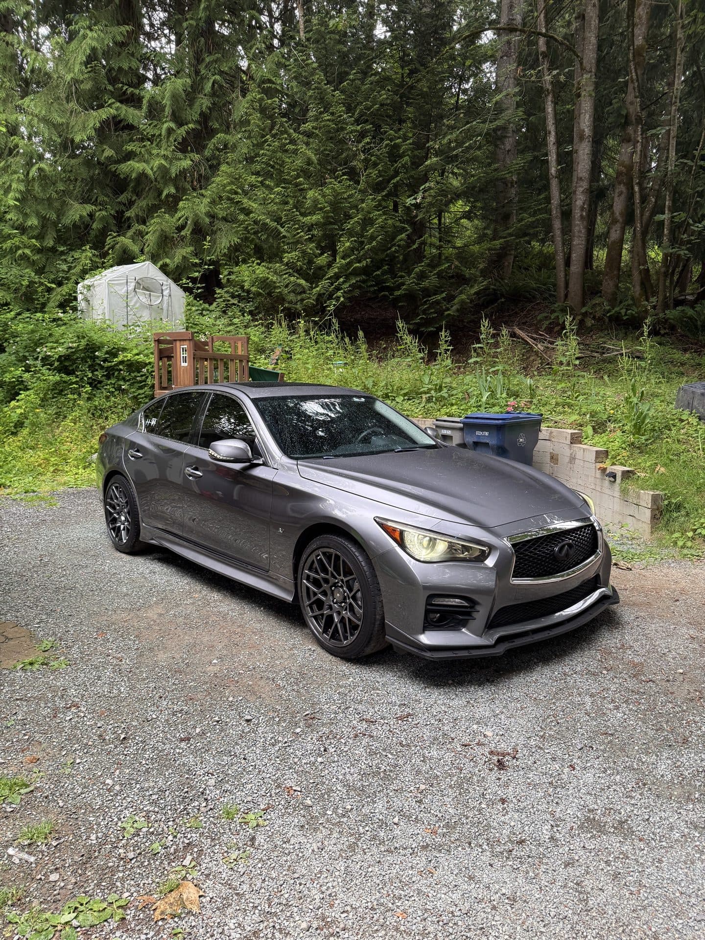 Gray Infiniti Q50 with clean, glossy paint after a full exterior detail