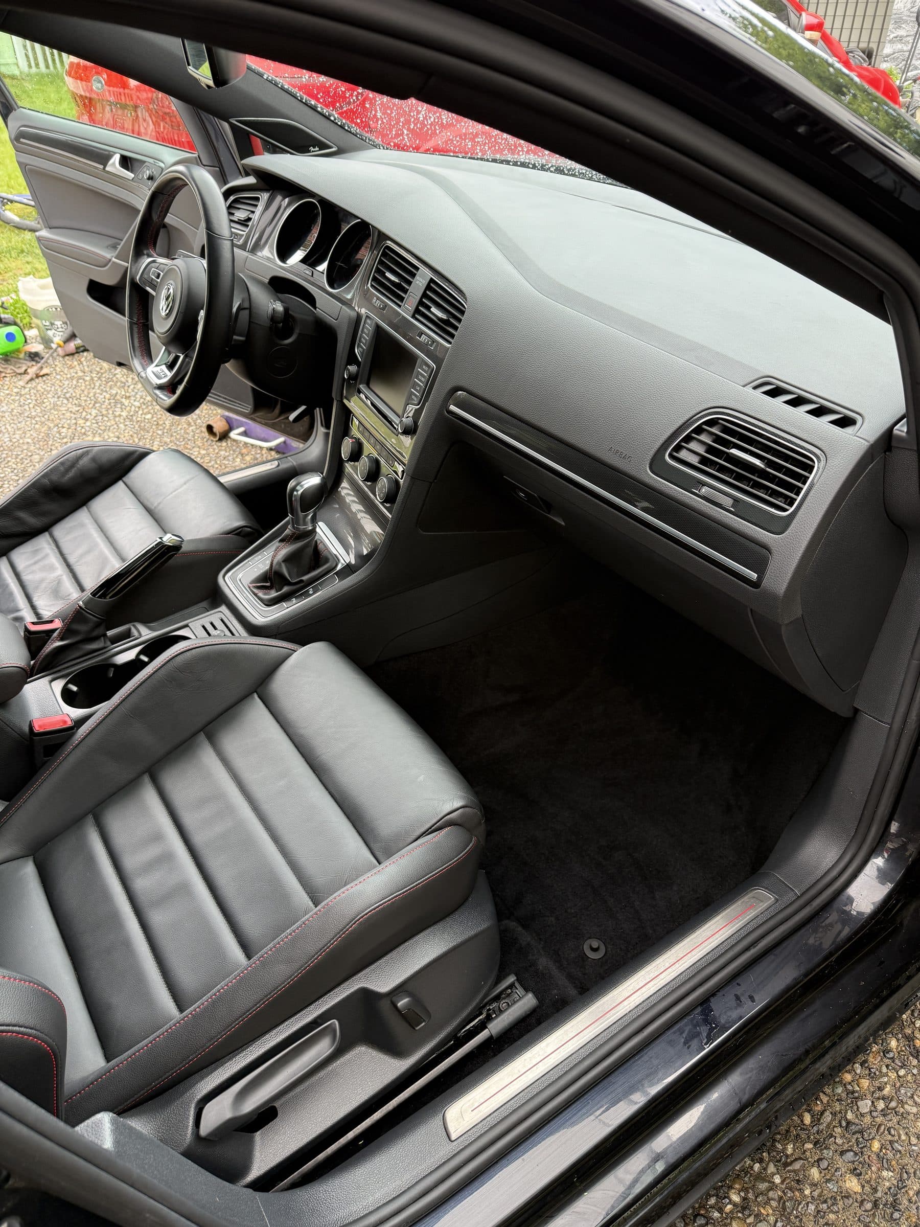 Volkswagen GTI dashboard and center console after interior detailing